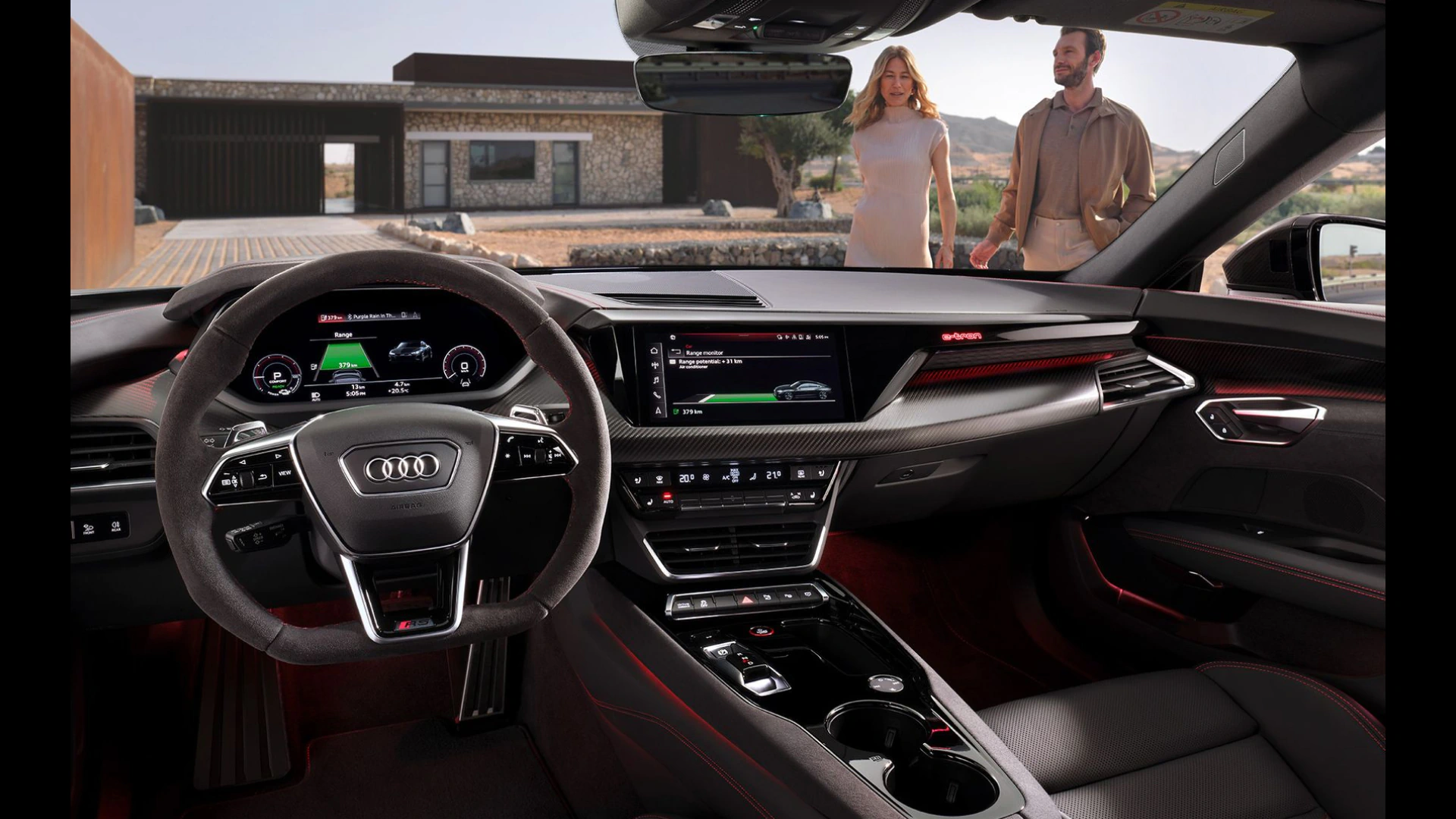 Screens of an Audi displaying digital services.